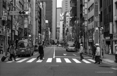 shinbashi district of tokyo at dawn streets and buildings shot on black and white film aaron henry rose